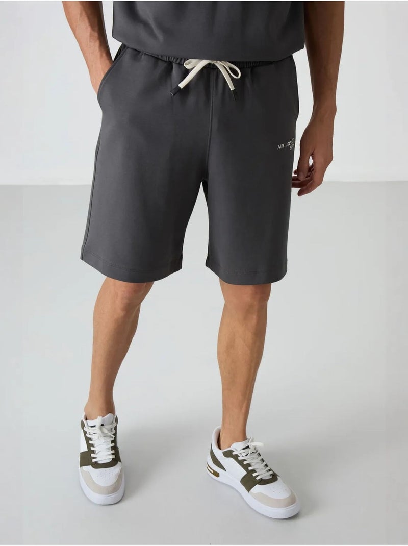 Conjunto de t-shirt oversized de manga curta e calções tommy Cinza-preto - Kiabi