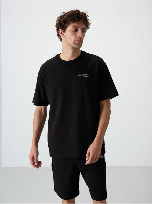Conjunto de t-shirt oversized de manga curta e calções tommy - Kiabi Conjunto de t-shirt oversized de manga curta e calções tommy - Kiabi