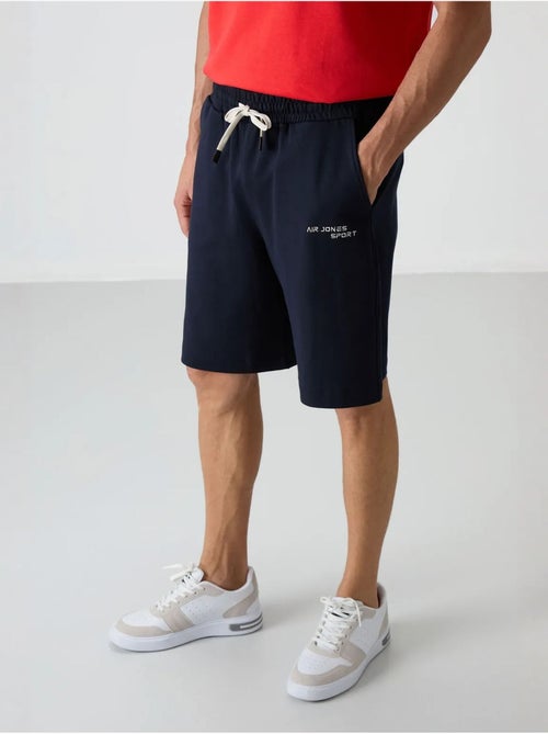 Conjunto de t-shirt oversized de manga curta e calções tommy - Kiabi Conjunto de t-shirt oversized de manga curta e calções tommy - Kiabi