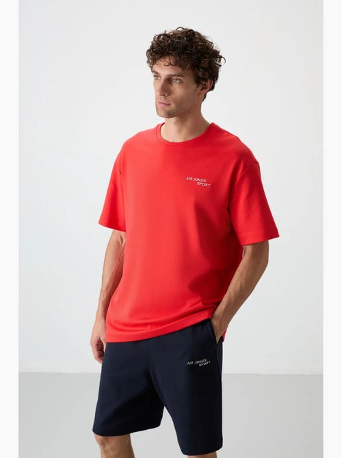 Conjunto de t-shirt oversized de manga curta e calções tommy - Kiabi Conjunto de t-shirt oversized de manga curta e calções tommy - Kiabi