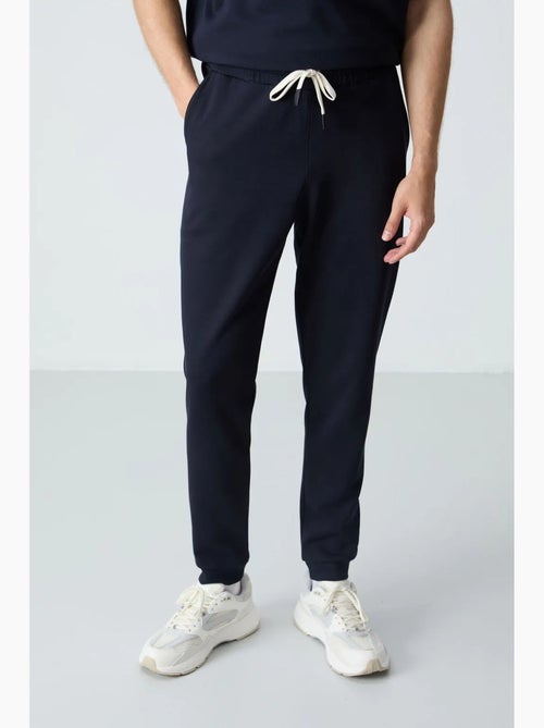 Conjunto de t-shirt oversized e calças de homem tommy - Kiabi Conjunto de t-shirt oversized e calças de homem tommy - Kiabi