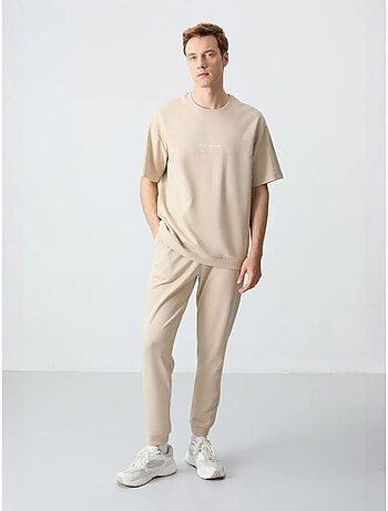 Conjunto de t-shirt oversized e calças de homem tommy