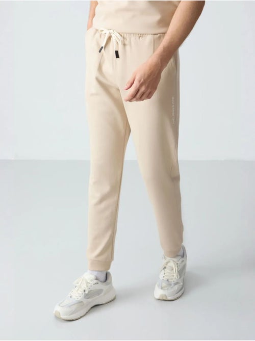 Conjunto de t-shirt oversized e calças de homem tommy - Kiabi Conjunto de t-shirt oversized e calças de homem tommy - Kiabi