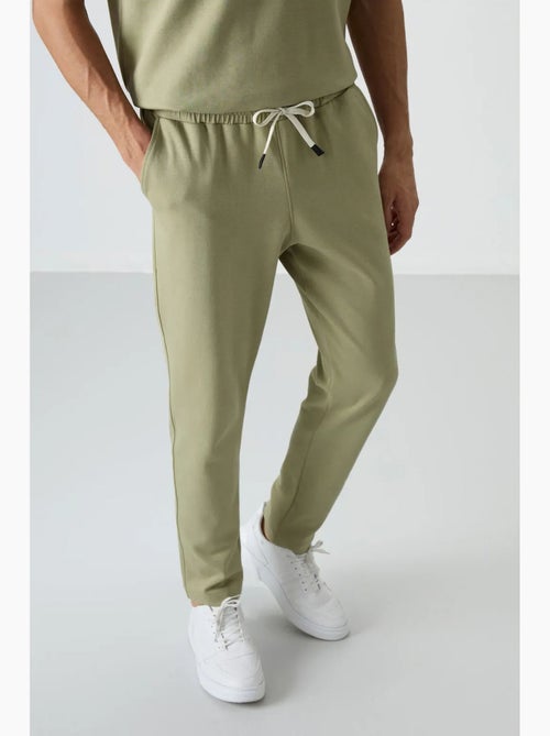 Conjunto de t-shirt oversized e calças de homem tommy - Kiabi Conjunto de t-shirt oversized e calças de homem tommy - Kiabi