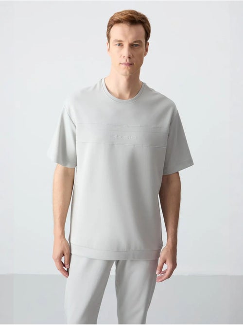 Conjunto de t-shirt oversized e calças de homem tommy - Kiabi Conjunto de t-shirt oversized e calças de homem tommy - Kiabi