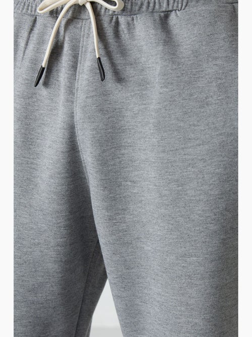 Conjunto de t-shirt oversized e calças de homem tommy - Kiabi Conjunto de t-shirt oversized e calças de homem tommy - Kiabi