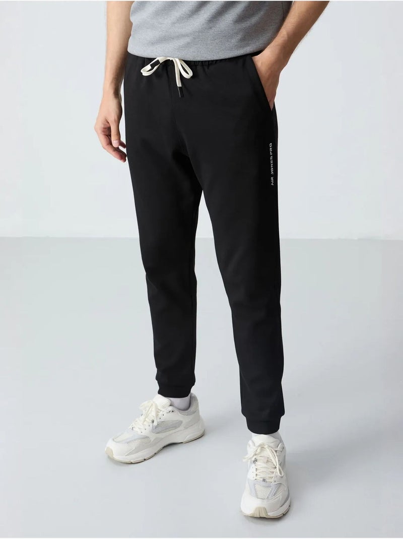 Conjunto de t-shirt oversized e calças de homem tommy Cinza - Kiabi