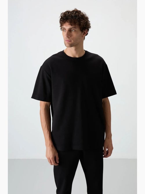 Conjunto de t-shirt oversized e calças de homem tommy - Kiabi Conjunto de t-shirt oversized e calças de homem tommy - Kiabi