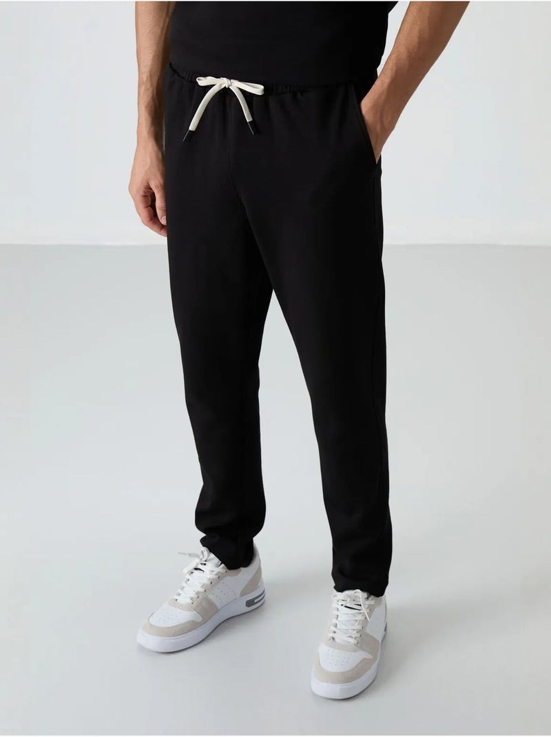 Conjunto de t-shirt oversized e calças de homem tommy Preto - Kiabi