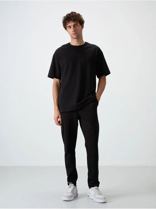 Conjunto de t-shirt oversized e calças de homem tommy - Kiabi Conjunto de t-shirt oversized e calças de homem tommy - Kiabi