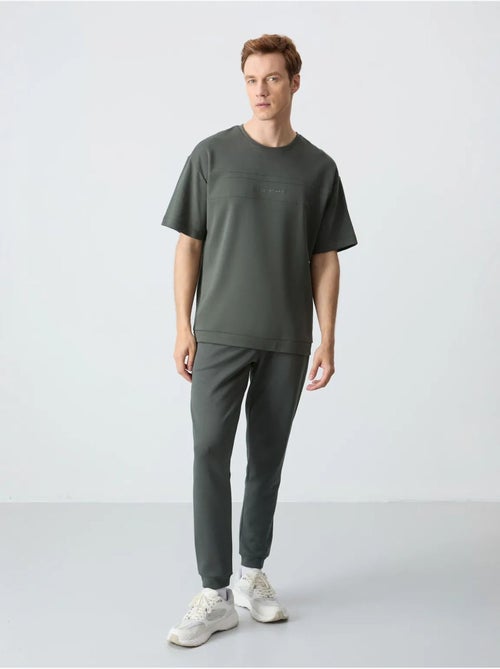 Conjunto de t-shirt oversized e calças de homem tommy - Kiabi Conjunto de t-shirt oversized e calças de homem tommy - Kiabi