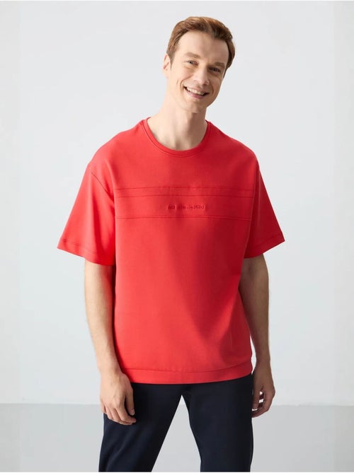 Conjunto de t-shirt oversized e calças de homem tommy - Kiabi Conjunto de t-shirt oversized e calças de homem tommy - Kiabi
