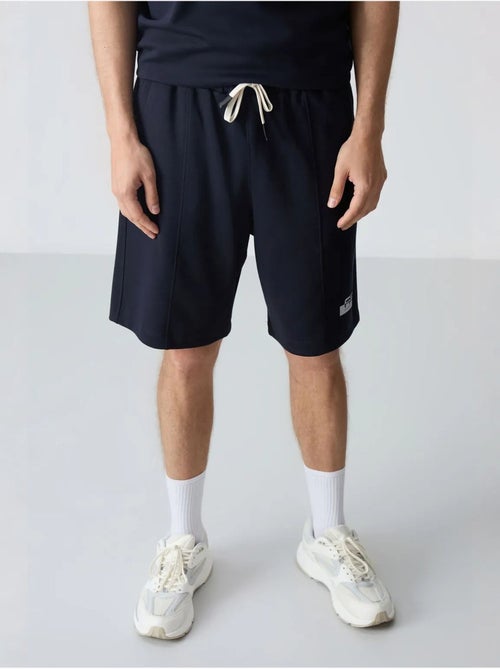 Conjunto de t-shirt oversized e calções para homem tommy - Kiabi Conjunto de t-shirt oversized e calções para homem tommy - Kiabi