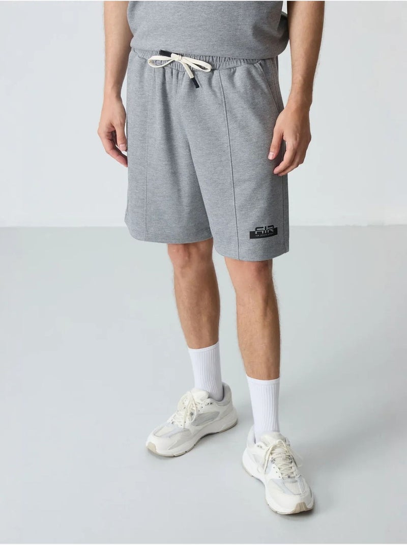 Conjunto de t-shirt oversized e calções para homem tommy Cinza - Kiabi