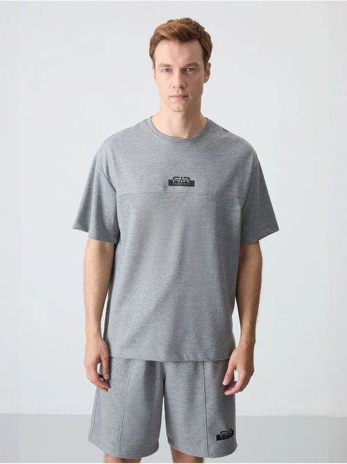 Conjunto de t-shirt oversized e calções para homem tommy - Kiabi Conjunto de t-shirt oversized e calções para homem tommy - Kiabi