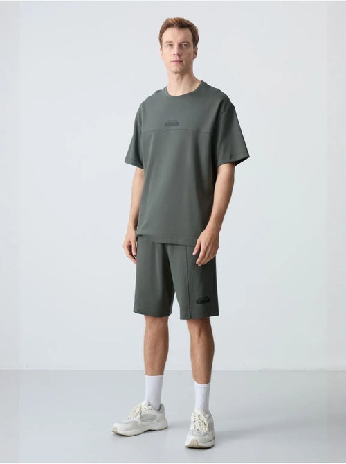 Conjunto de t-shirt oversized e calções para homem tommy - Kiabi Conjunto de t-shirt oversized e calções para homem tommy - Kiabi