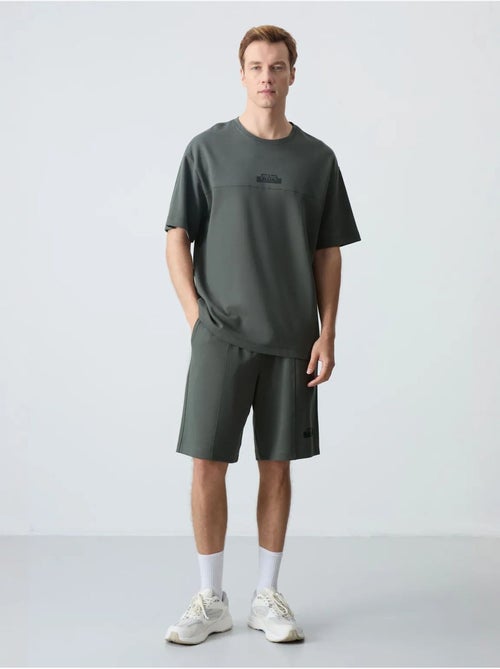 Conjunto de t-shirt oversized e calções para homem tommy - Kiabi Conjunto de t-shirt oversized e calções para homem tommy - Kiabi