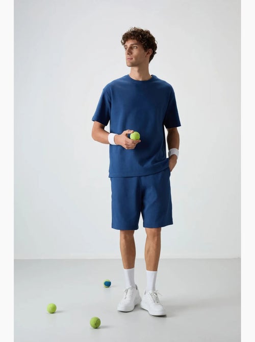 Conjunto de t-shirt oversized e calções tommy - Kiabi Conjunto de t-shirt oversized e calções tommy - Kiabi