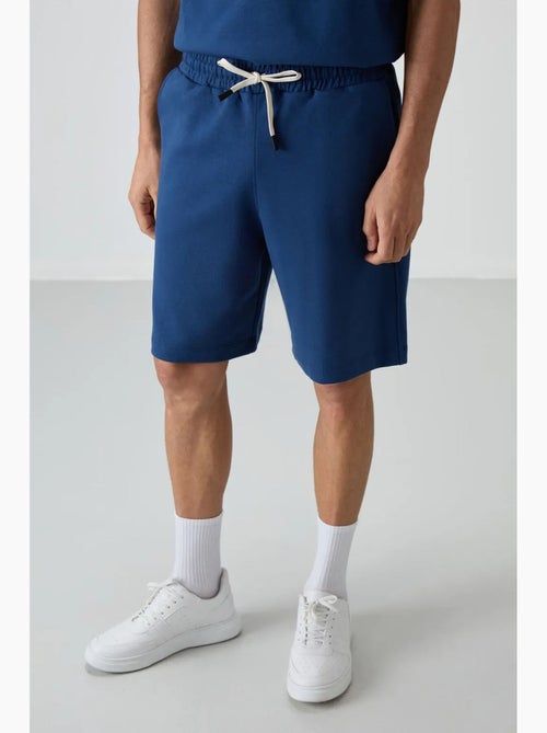 Conjunto de t-shirt oversized e calções tommy - Kiabi Conjunto de t-shirt oversized e calções tommy - Kiabi