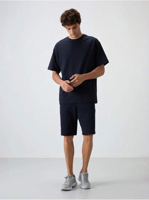 Conjunto de t-shirt oversized e calções tommy - Kiabi Conjunto de t-shirt oversized e calções tommy - Kiabi