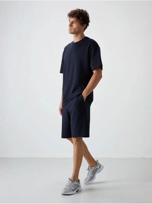 Conjunto de t-shirt oversized e calções tommy - Kiabi Conjunto de t-shirt oversized e calções tommy - Kiabi