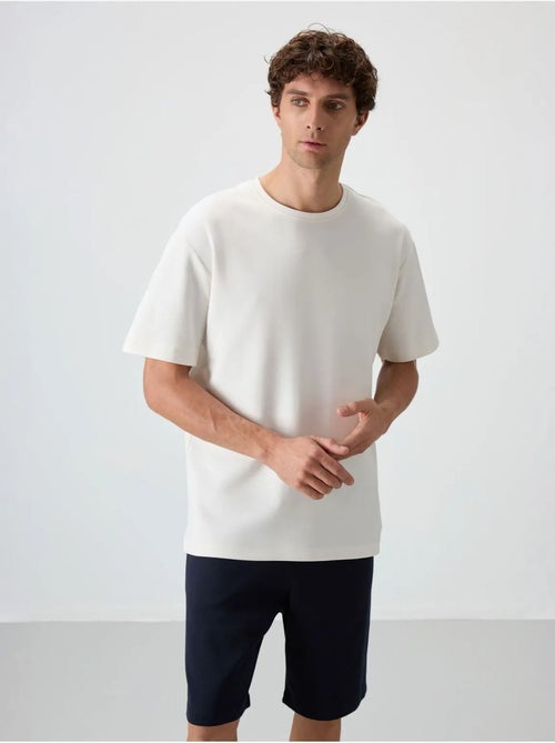 Conjunto de t-shirt oversized e calções tommy - Kiabi Conjunto de t-shirt oversized e calções tommy - Kiabi