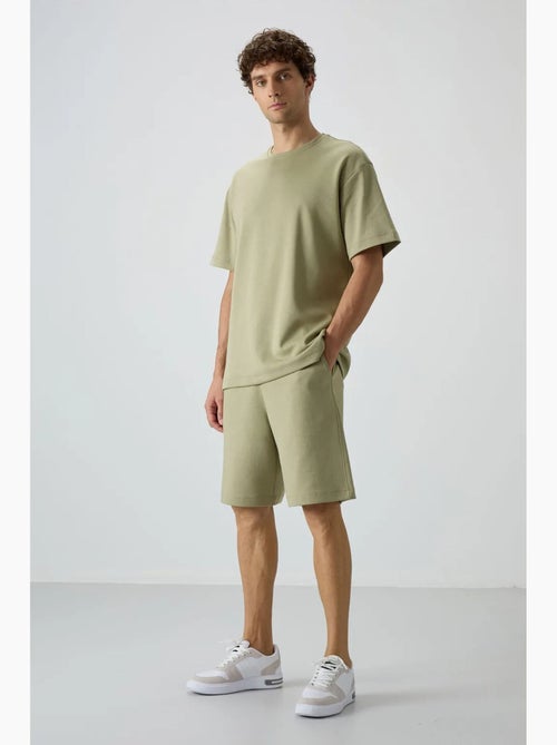 Conjunto de t-shirt oversized e calções tommy - Kiabi Conjunto de t-shirt oversized e calções tommy - Kiabi