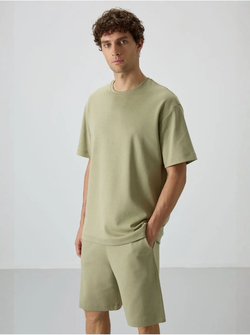 Conjunto de t-shirt oversized e calções tommy Cáqui - Kiabi