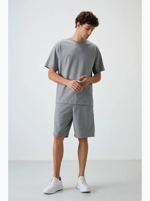 Conjunto de t-shirt oversized e calções tommy - Kiabi Conjunto de t-shirt oversized e calções tommy - Kiabi