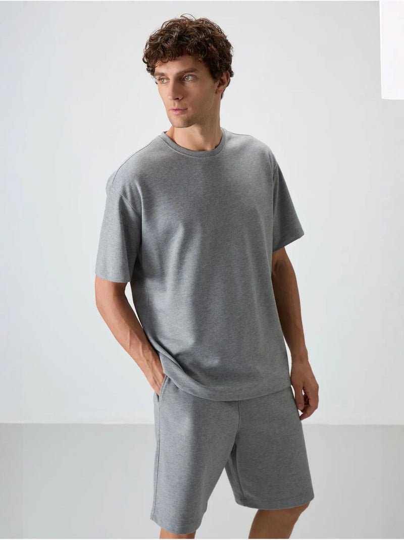 Conjunto de t-shirt oversized e calções tommy Cinza - Kiabi