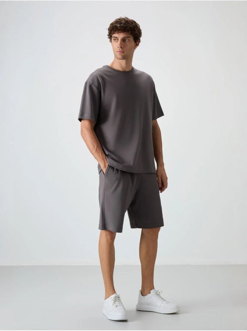 Conjunto de t-shirt oversized e calções tommy - Kiabi Conjunto de t-shirt oversized e calções tommy - Kiabi