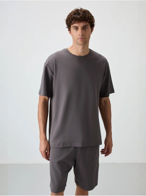Conjunto de t-shirt oversized e calções tommy - Kiabi Conjunto de t-shirt oversized e calções tommy - Kiabi