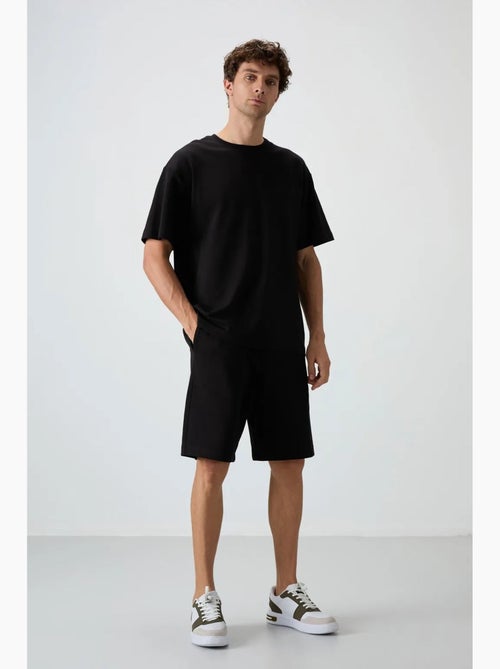 Conjunto de t-shirt oversized e calções tommy - Kiabi Conjunto de t-shirt oversized e calções tommy - Kiabi