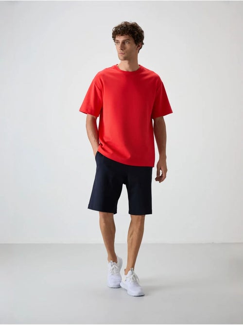 Conjunto de t-shirt oversized e calções tommy - Kiabi Conjunto de t-shirt oversized e calções tommy - Kiabi
