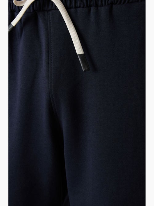Conjunto de t-shirt oversized e calções tommy - Kiabi Conjunto de t-shirt oversized e calções tommy - Kiabi