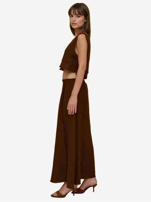 Conjunto em musselina com saia de cintura elástica e blusa com detalhe de atar na lateral hiccup - Kiabi Conjunto em musselina com saia de cintura elástica e blusa com detalhe de atar na lateral hiccup - Kiabi