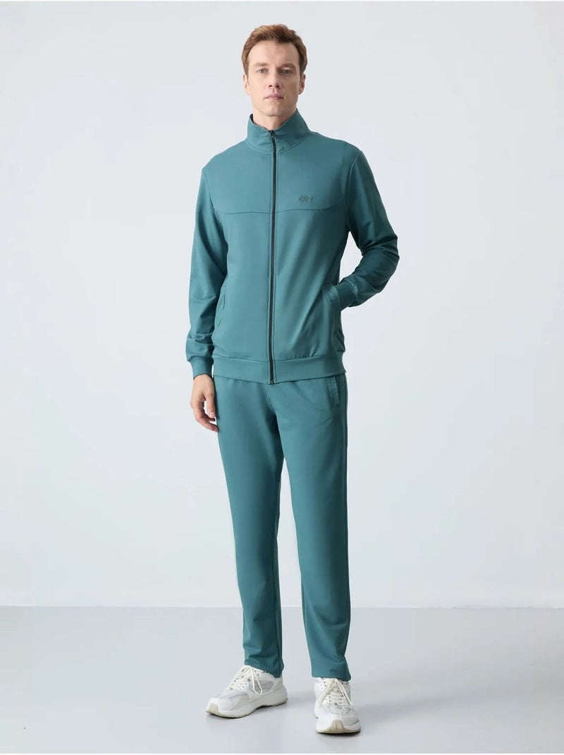 Conjunto masculino de sweatshirt com gola com fecho e calças tommy Azul-petróleo - Kiabi