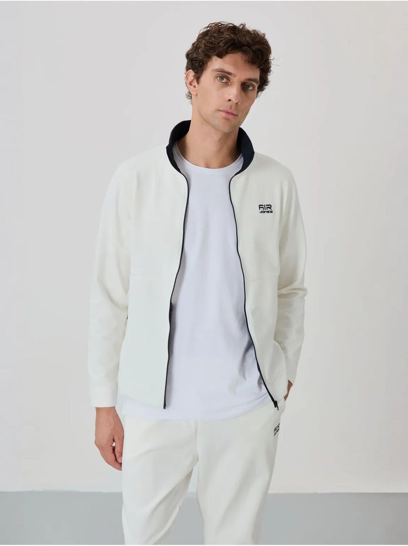 Conjunto masculino de sweatshirt com gola com fecho e calças tommy Branco sujo - Kiabi