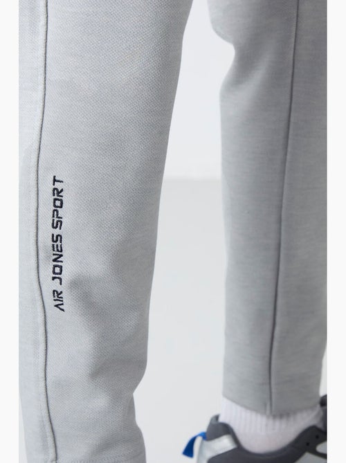 Conjunto masculino de sweatshirt com gola com fecho e calças tommy - Kiabi Conjunto masculino de sweatshirt com gola com fecho e calças tommy - Kiabi