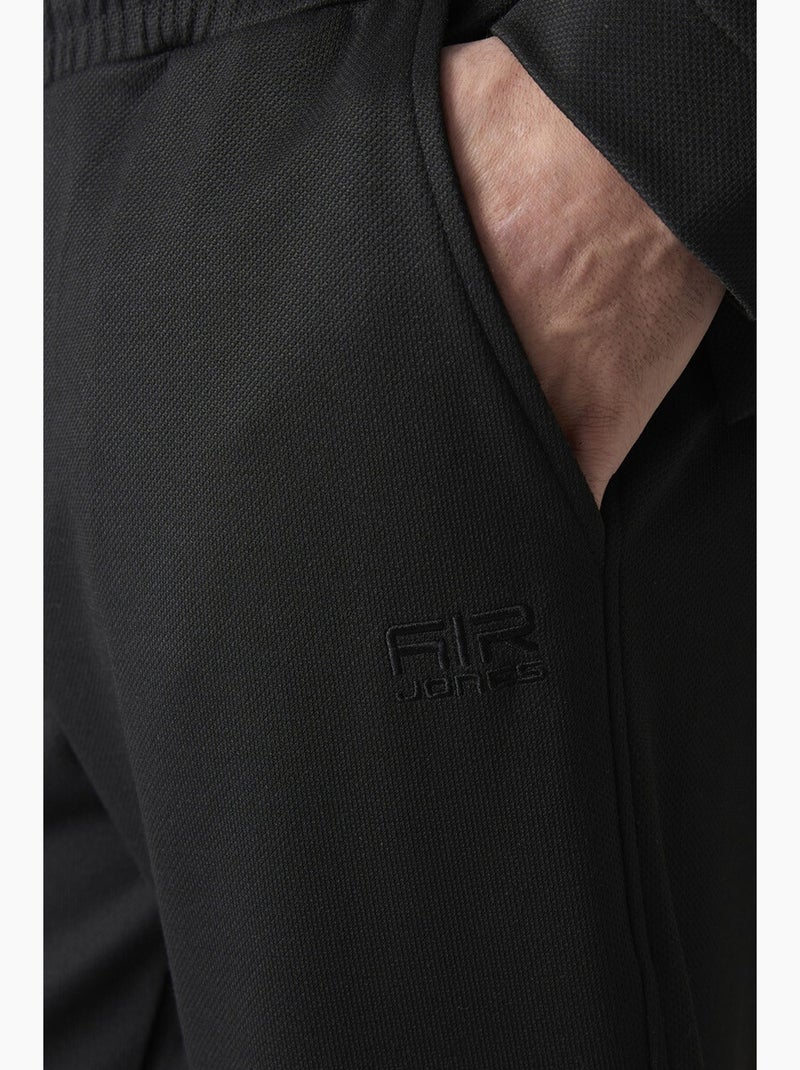 Conjunto masculino de sweatshirt com gola com fecho e calças tommy Preto - Kiabi