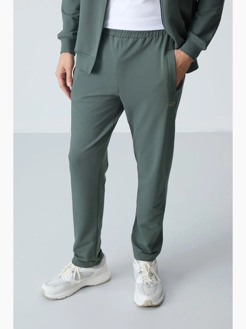 Conjunto masculino de sweatshirt com gola com fecho e calças tommy Verde - Kiabi