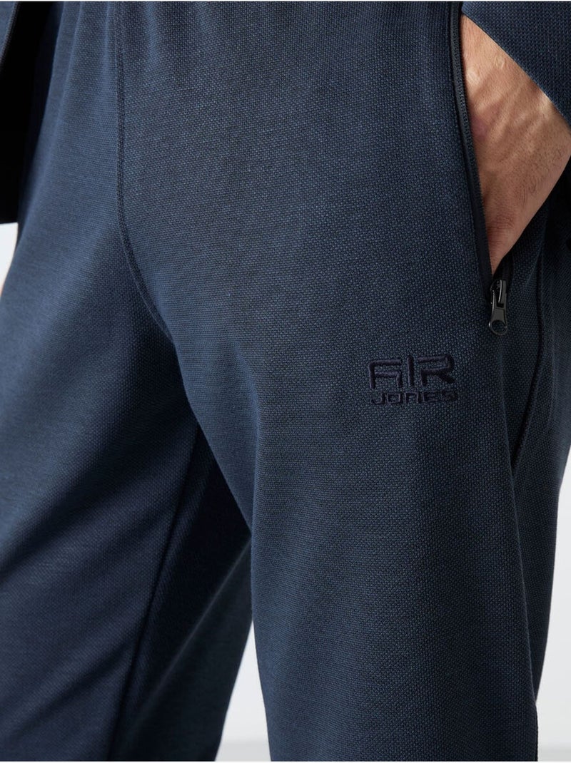 Conjunto masculino de sweatshirt de fleece e calças tommy Azul-marinho - Kiabi