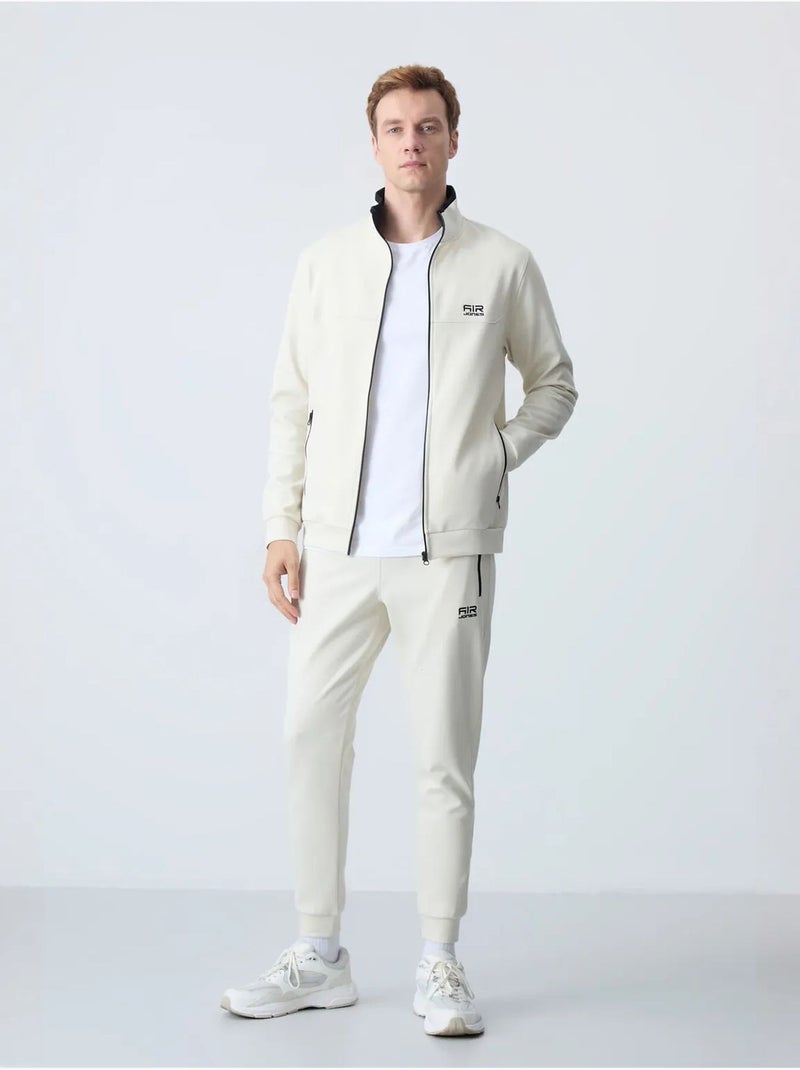 Conjunto masculino de sweatshirt de fleece e calças tommy Creme - Kiabi