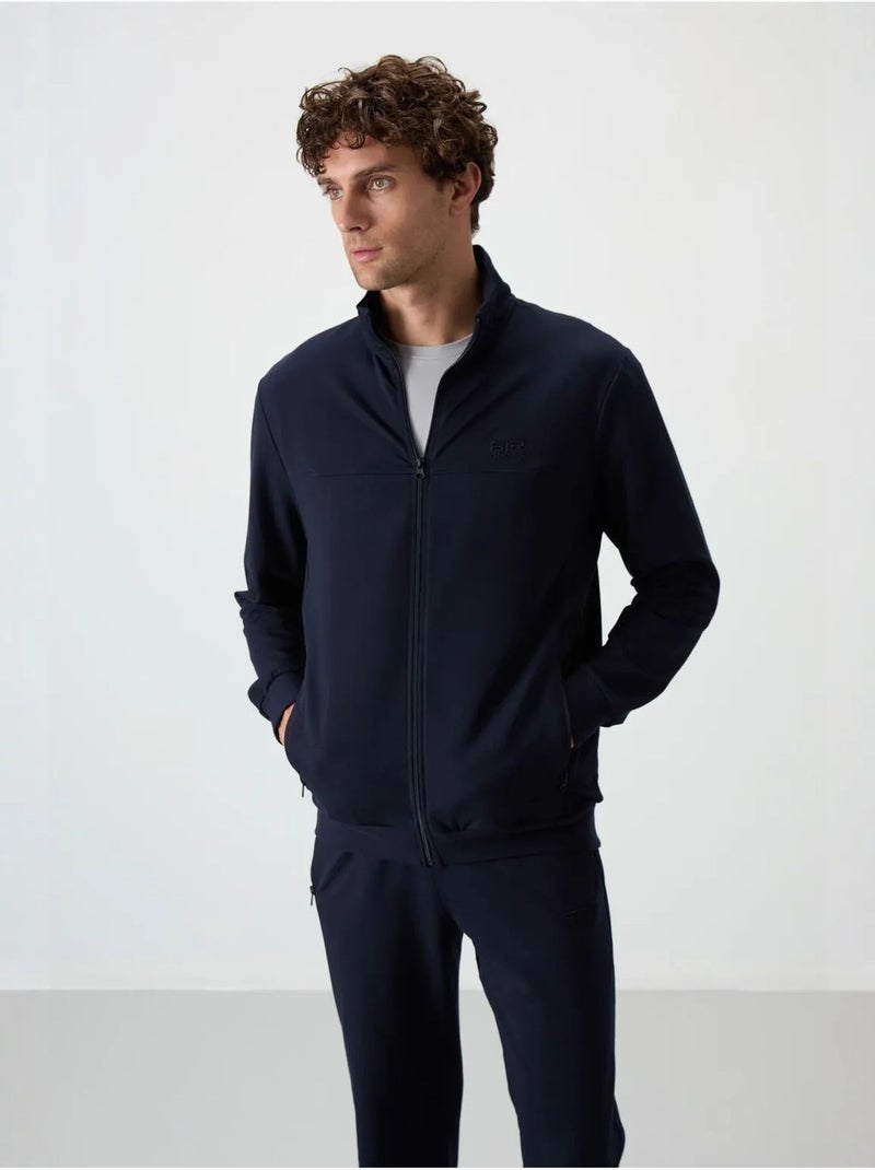 Conjunto masculino de sweatshirt e calças em fleece tricotado tommy Azul-marinho - Kiabi