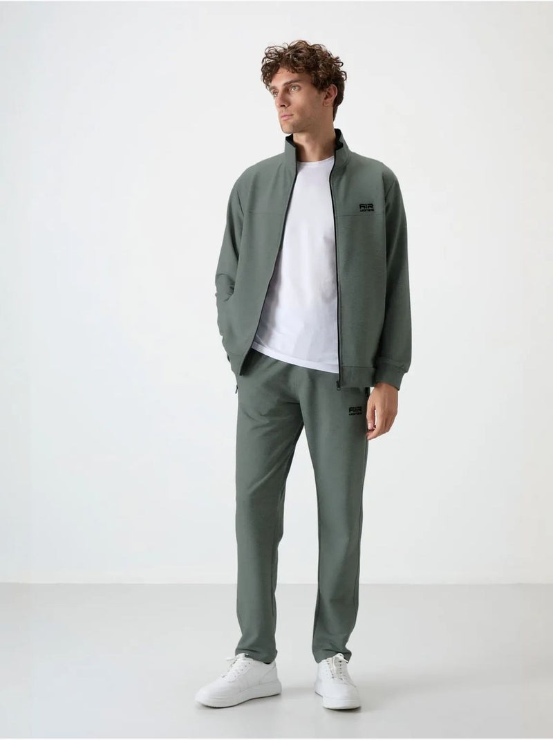 Conjunto masculino de sweatshirt e calças em fleece tricotado tommy Verde - Kiabi