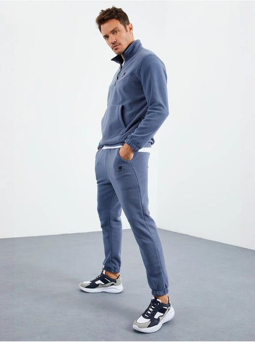 Conjunto masculino de sweatshirt e calças em poliéster tommy - Kiabi Conjunto masculino de sweatshirt e calças em poliéster tommy - Kiabi