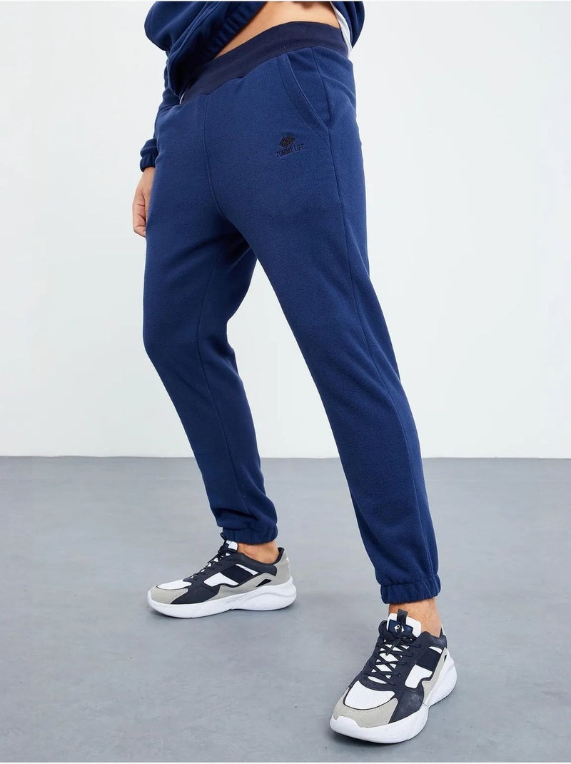 Conjunto masculino de sweatshirt e calças em poliéster tommy Azul-marinho - Kiabi