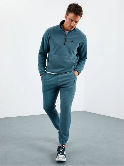 Conjunto masculino de sweatshirt e calças em poliéster tommy - Kiabi Conjunto masculino de sweatshirt e calças em poliéster tommy - Kiabi