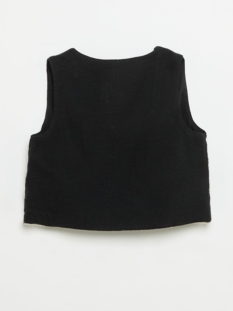 Conjunto top sem mangas + Colete Preto - Kiabi