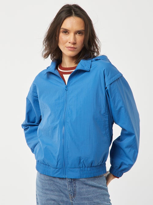 Corta-vento com capuz - Kiabi